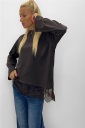 maglia asimmetrica aurora